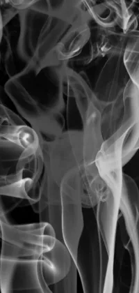 This phone live wallpaper displays a captivating, close-up image of voluminous smoke
