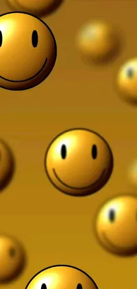 This charming live wallpaper features a swarm of cheerful smiley faces floating against a glittering gold background