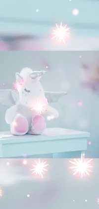 Brighten up your phone's display with this charming live wallpaper featuring a stuffed unicorn sitting on a table