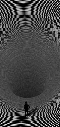 If you're looking for a captivating and immersive live wallpaper for your phone, look no further! This black and white photo features an optical illusion of a never-ending tunnel with DMT-inspired ripples emanating from a black hole in the distance