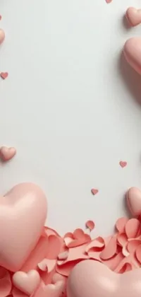 Enhance your phone's appearance with a live wallpaper featuring a pink heart picture frame