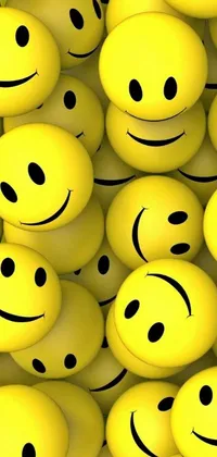 Brighten up your phone screen with this stunning phone live wallpaper! It features a group of yellow smiley faces of various expressions, such as joyful, laughing, scheming, among others
