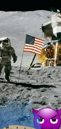 This phone live wallpaper depicts an inspiring astronaut standing on the moon as an American flag waves in the background