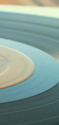 Experience mesmerizing and soothing visuals with this vinyl record live wallpaper