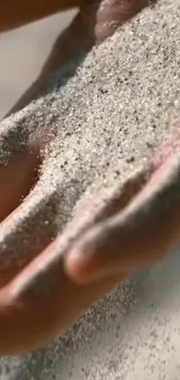 Introduce stunning close-up shots of sand through kinetic pointillism with this live wallpaper