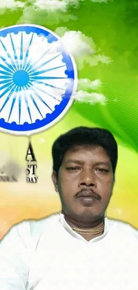This phone live wallpaper depicts a man seated cross-legged in deep meditation in front of the Indian flag