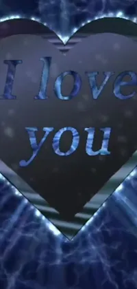 This live wallpaper for phones is a beautiful blue and black design featuring a holographic heart with the words "I Love You" written on it