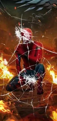 This stunning phone live wallpaper features a realistic image of the superhero Spider-Man in a dynamic kneeling pose in front of a fiery background