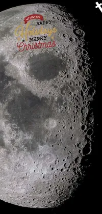 This phone live wallpaper features a close-up of a highly detailed moon against a deep blue and black sky