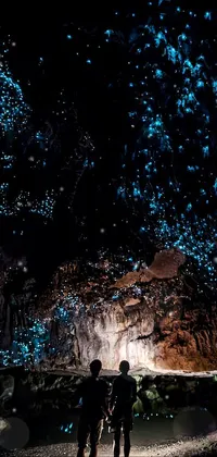 This phone live wallpaper features a cave in the Azores with glowing spores and intricate bioluminescent creatures