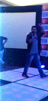 This stunning phone live wallpaper features a dynamic man rapping on a white dance floor in a holographic world