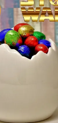Transform your phone screen into a fun and exciting space with the Candy Bowl Live Wallpaper