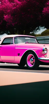 50s Pink Roadster Car on Road Live Wallpaper